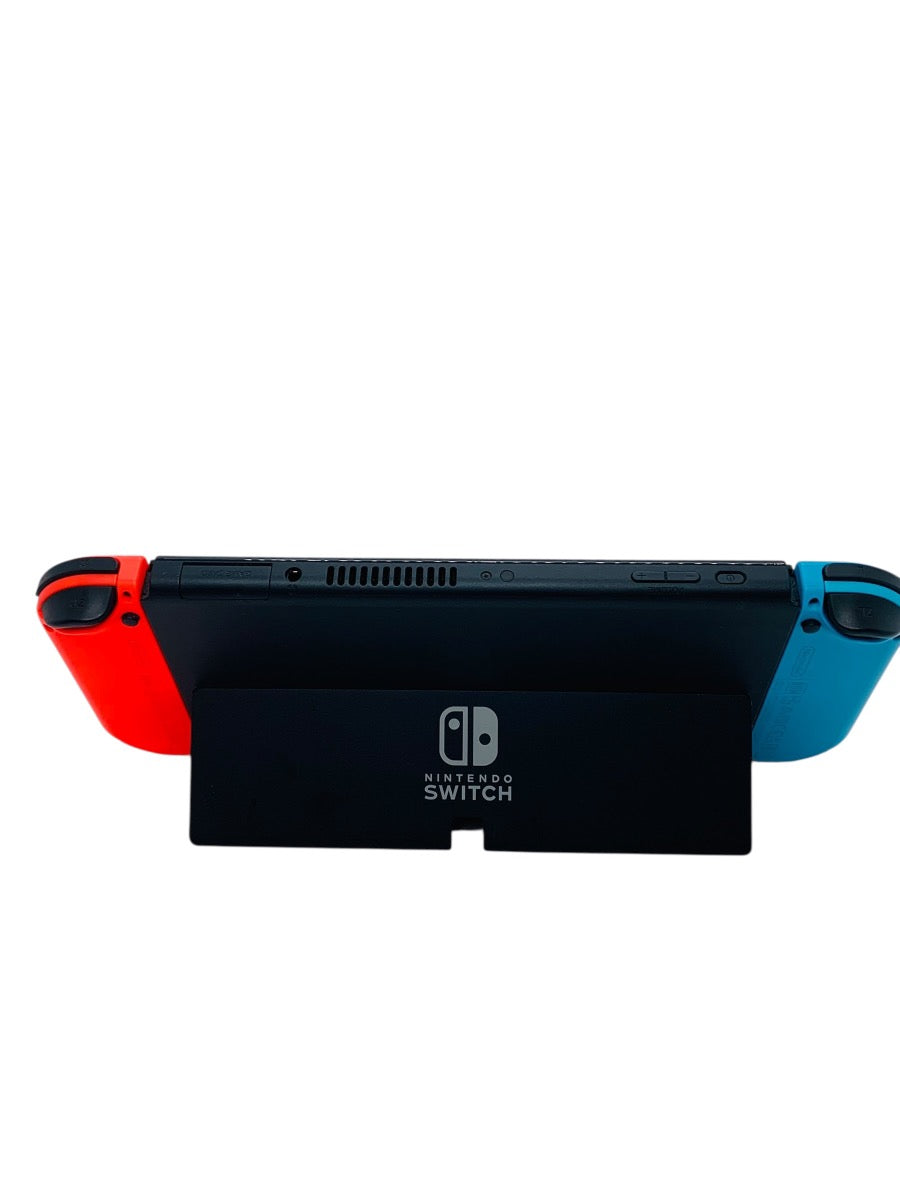 Nintendo Switch OLED Video Game Console HEG-001 Red/Blue w/ Zelda Case